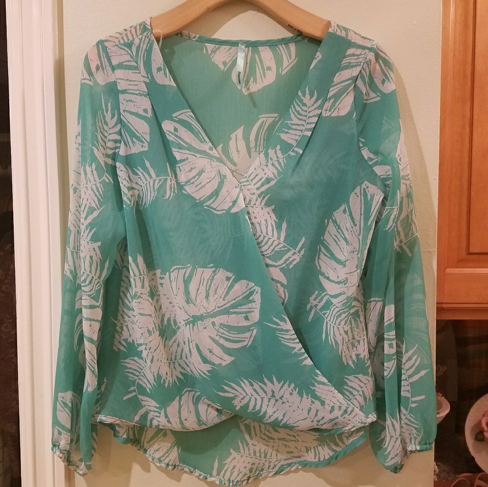 Turqoiuse flowy wrap blouse